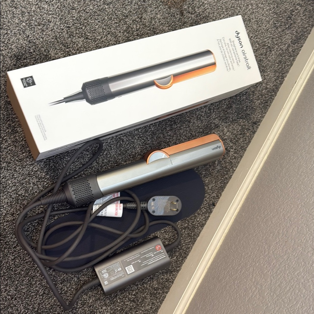 Dyson Airstrait in Silver and Orange